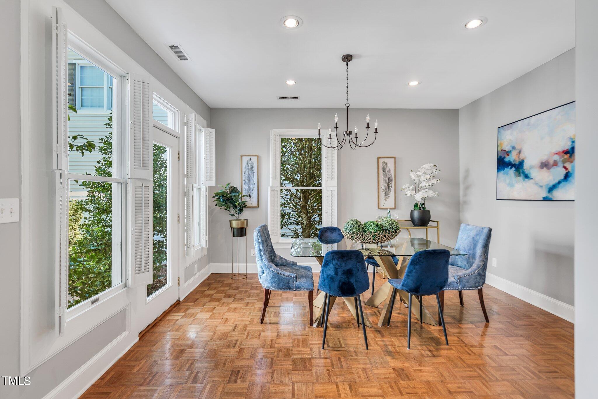 25 East Camden Pittsboro, NC 27312 - Photo 17 of 71 a view of a dining room with furniture window and wooden floor