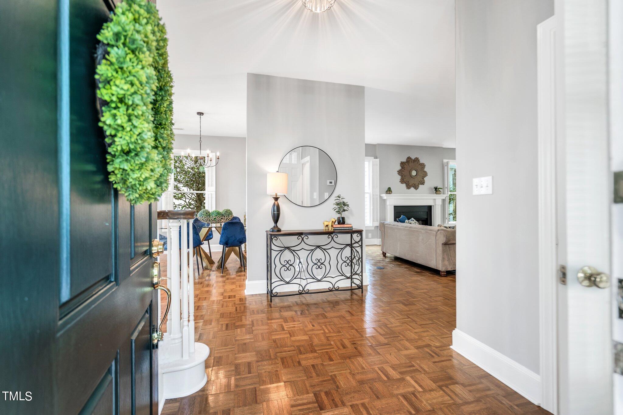 25 East Camden Pittsboro, NC 27312 - Photo 2 of 71 a living room with furniture and a chandelier