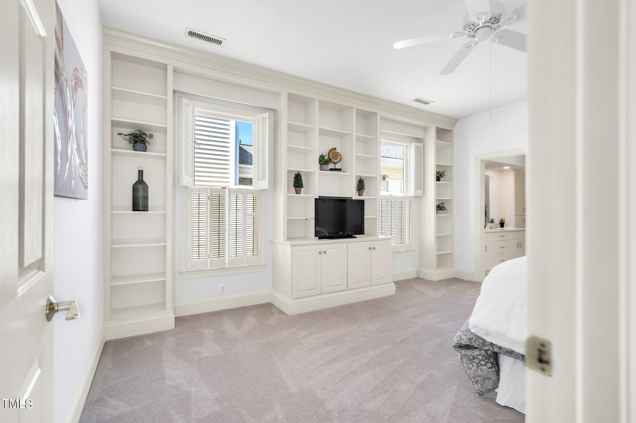 25 East Camden Pittsboro, NC 27312 - Photo 31 of 71 a living room with furniture and a flat screen tv