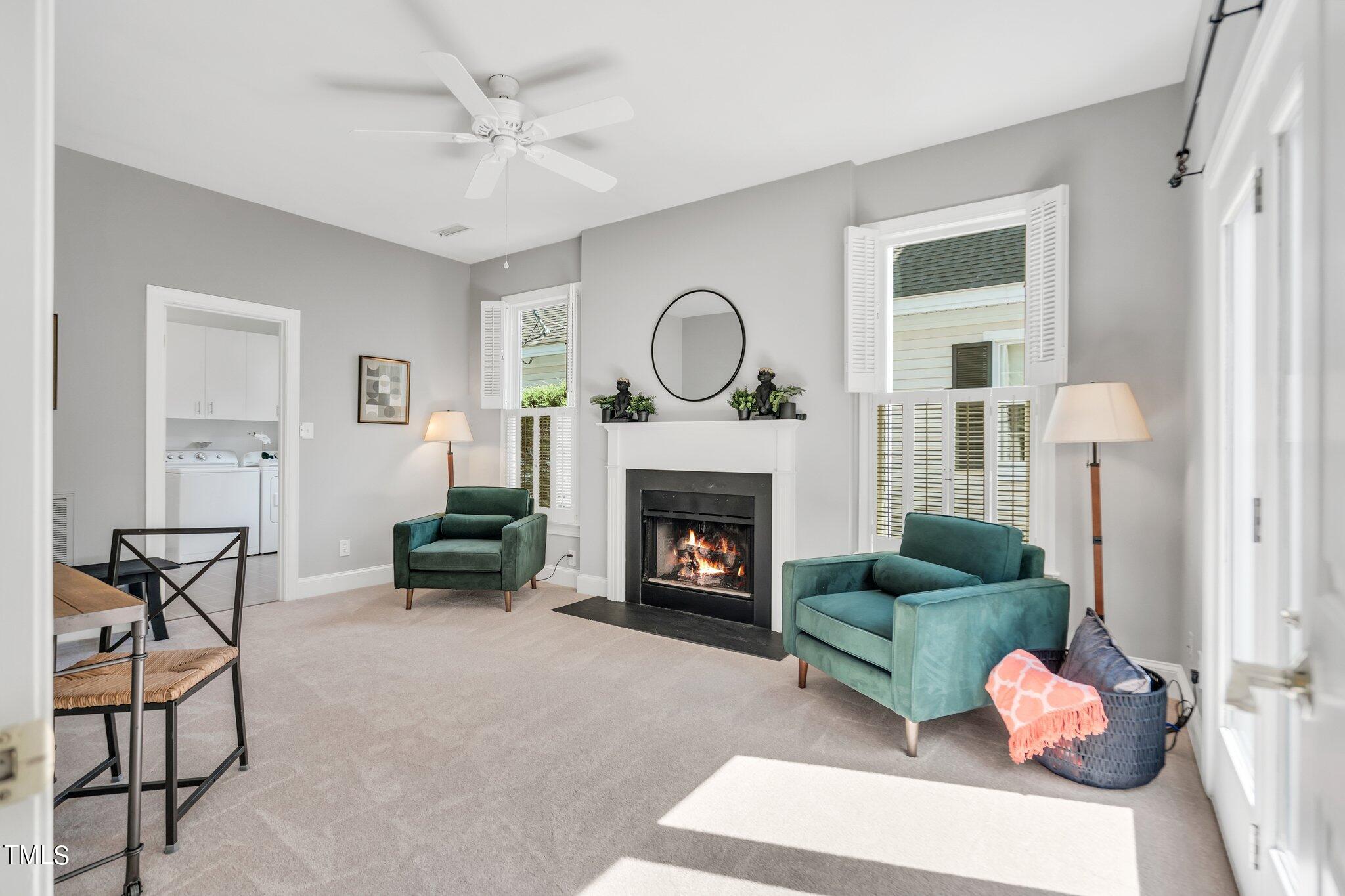 25 East Camden Pittsboro, NC 27312 - Photo 38 of 71 a living room with furniture and a fireplace