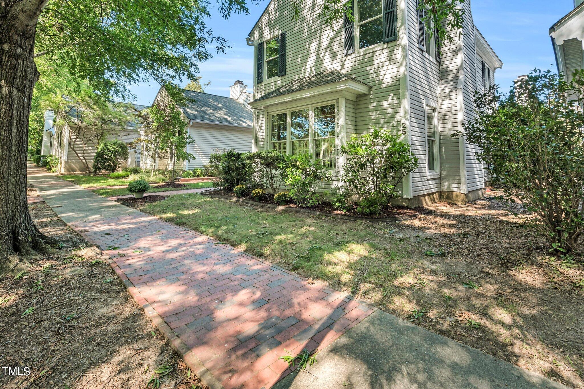 25 East Camden Pittsboro, NC 27312 - Photo 56 of 71 a view of a big yard in front of a brick building