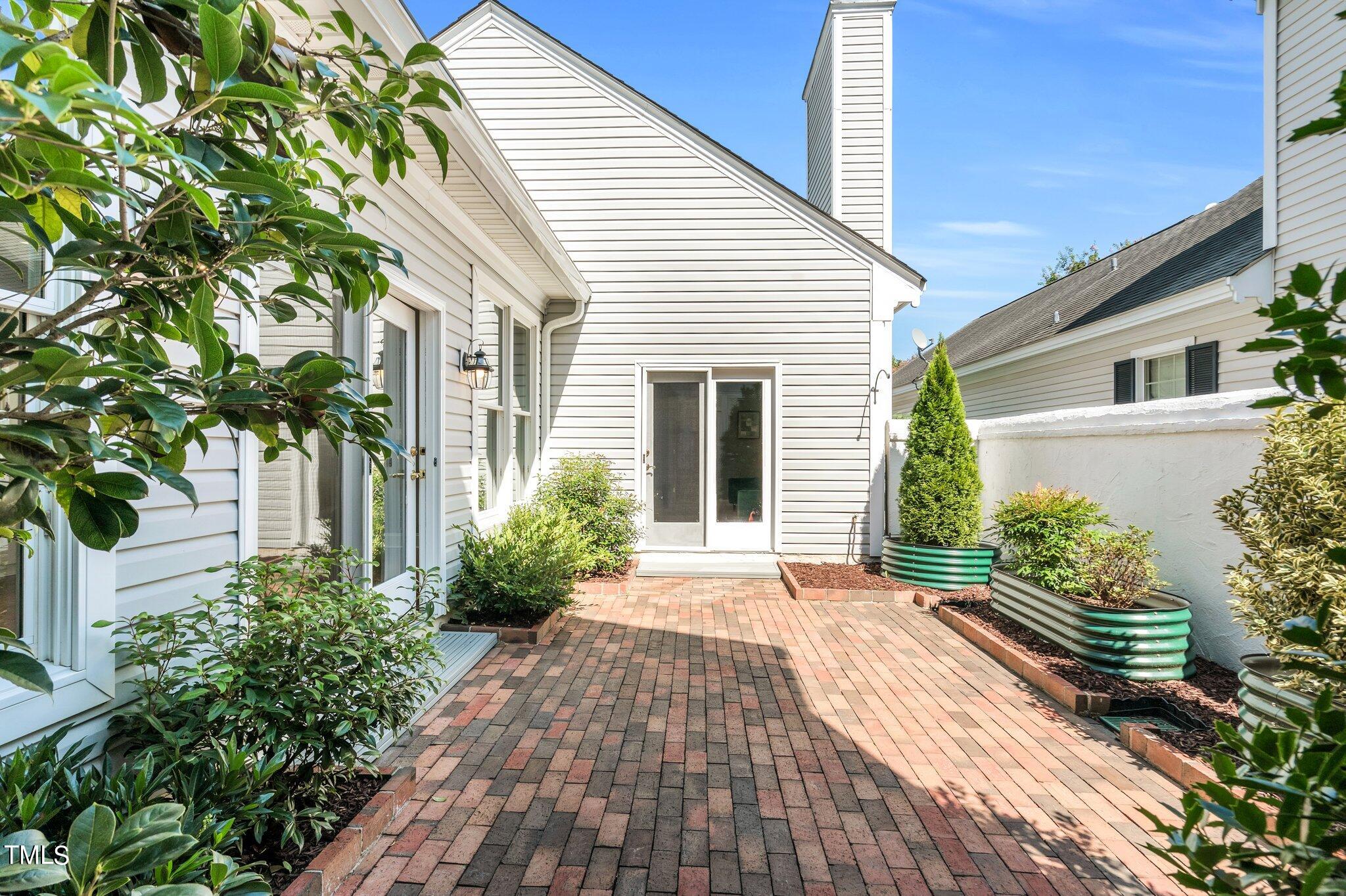 25 East Camden Pittsboro, NC 27312 - Photo 61 of 71 a front view of a house with garden