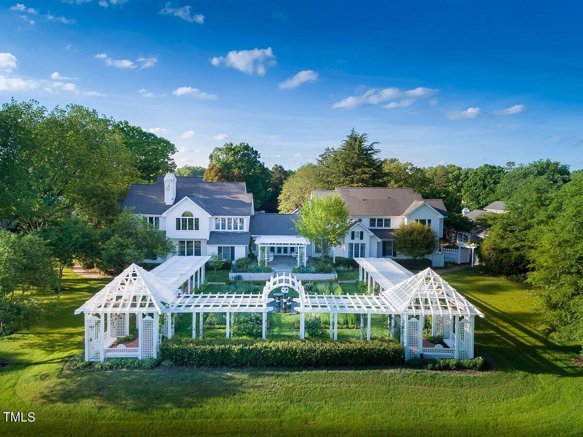 25 East Camden Pittsboro, NC 27312 - Photo 67 of 71 a front view of a house with a garden