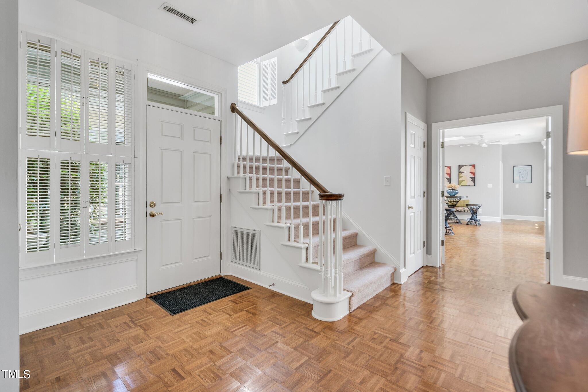 25 East Camden Pittsboro, NC 27312 - Photo 10 of 71 a view of entryway with wooden floor and windows