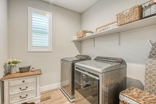 a bedroom with a bed and a tv