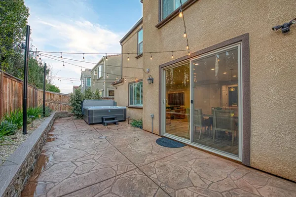 an aerial view of a house with a ocean view