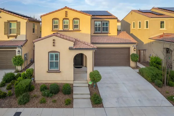 a view of a swimming pool and a chairs