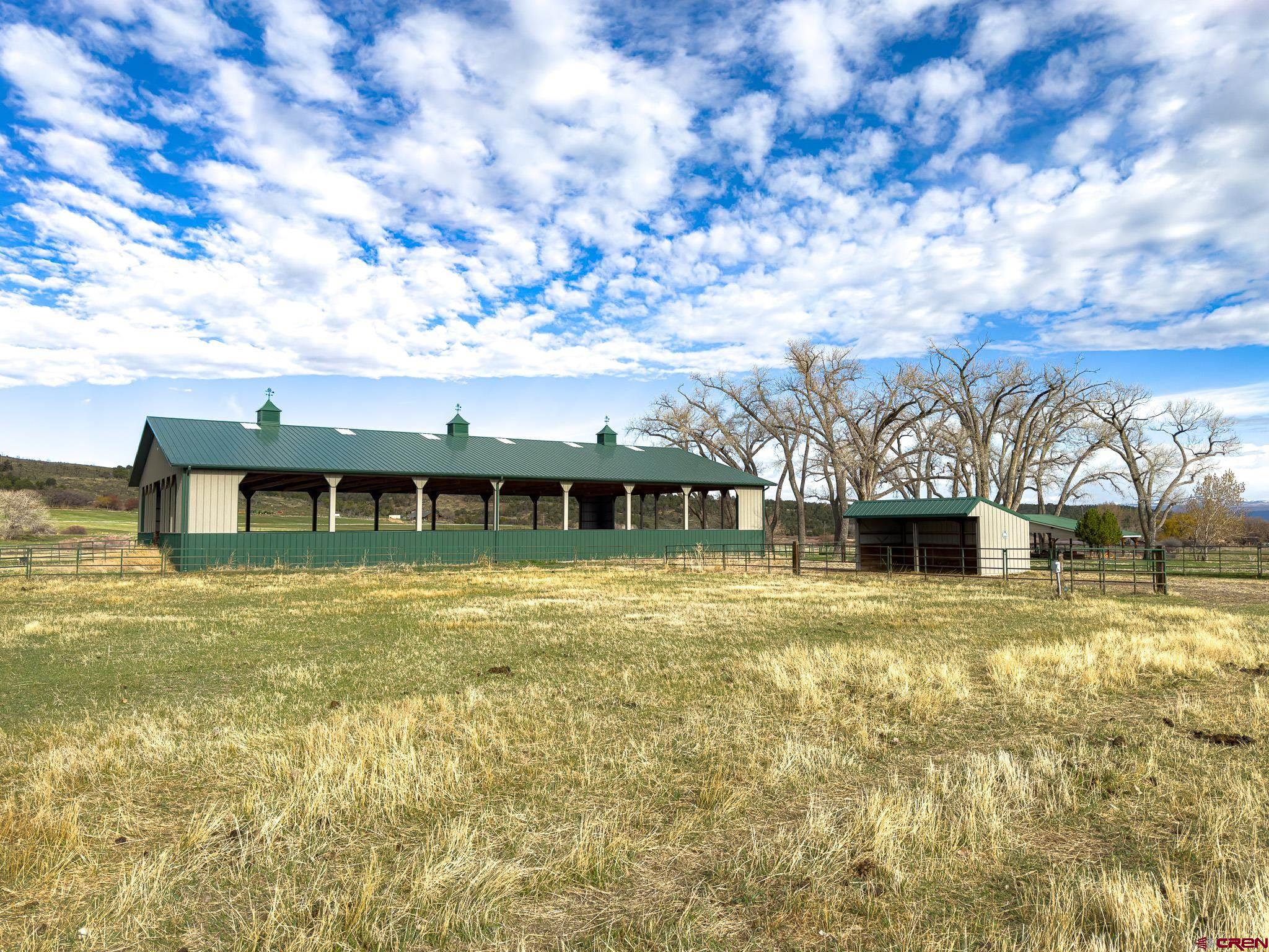 1071 Black Canyon Road Crawford, CO 81415 - Photo 34 of 36 a view of a house with a yard balcony