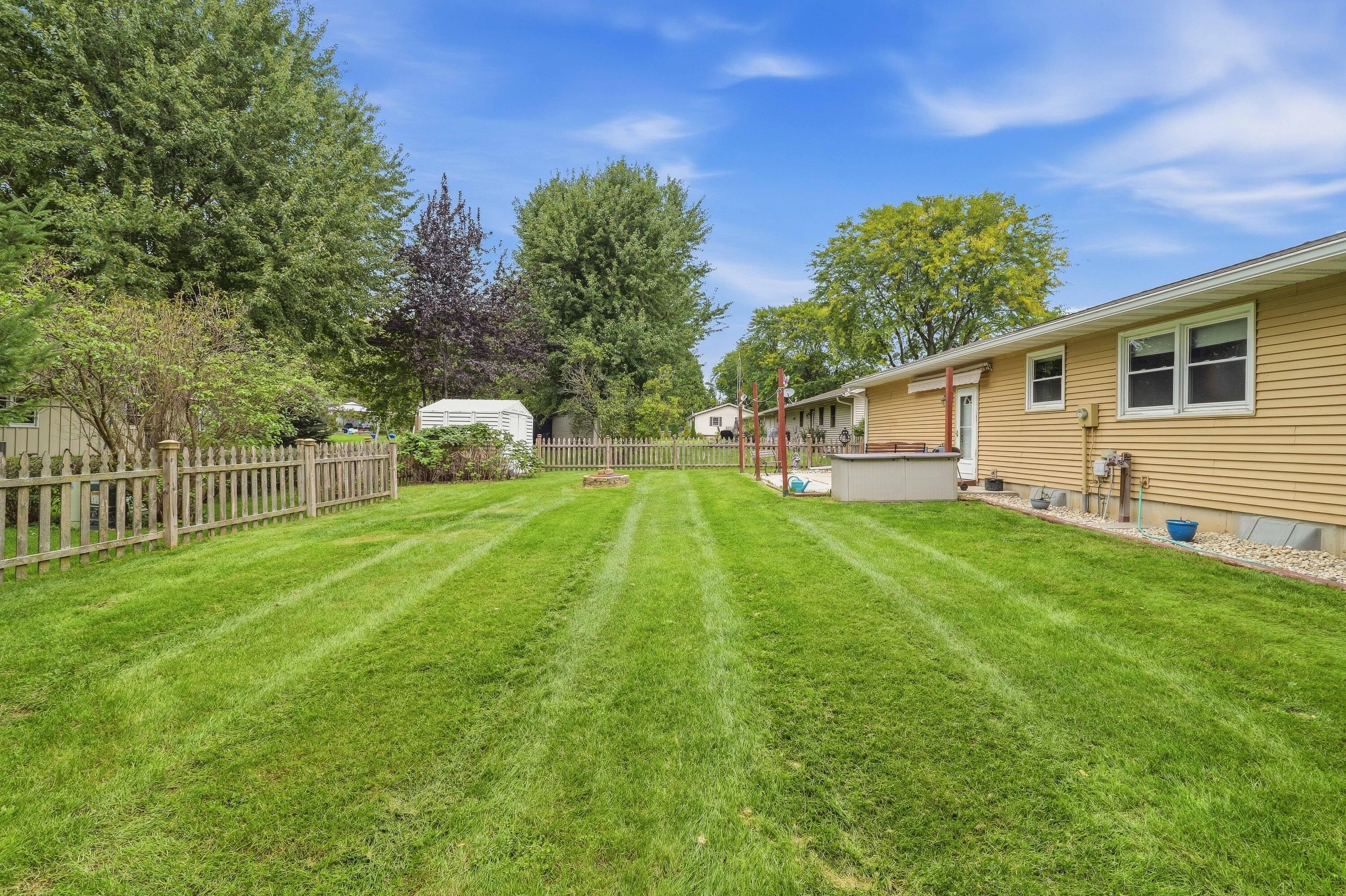 1108 Homestead Road Beaver Dam, WI 53916 - Photo 31 of 42 Fenced in Backyard