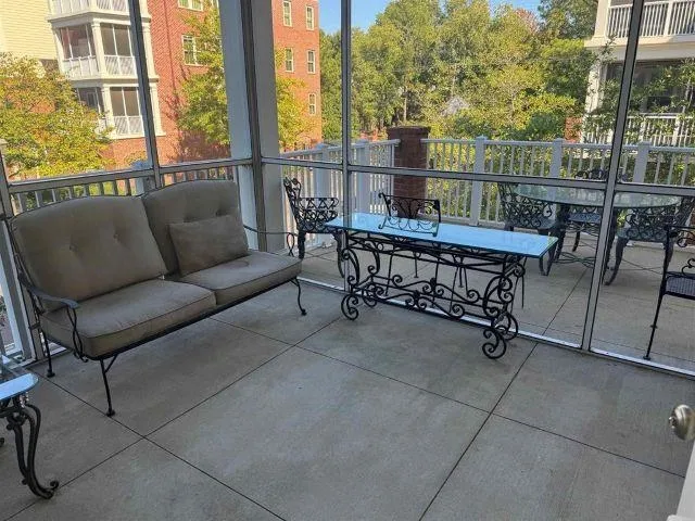 a view of a terrace with furniture