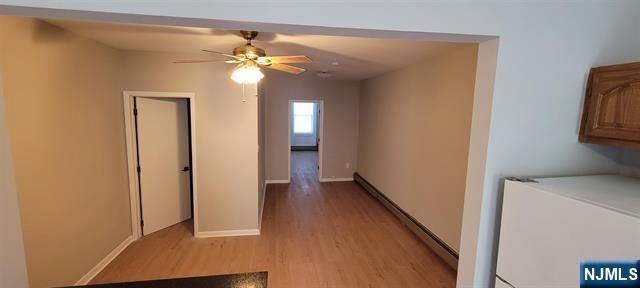 829 Willow Avenue, Unit 3 Hoboken, NJ 07030 - Photo 10 of 16 a view of a hallway with a chandelier