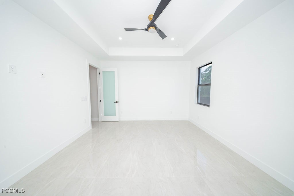 2819 34th Street West Lehigh Acres, FL 33971 - Photo 19 of 41 a view of an empty room