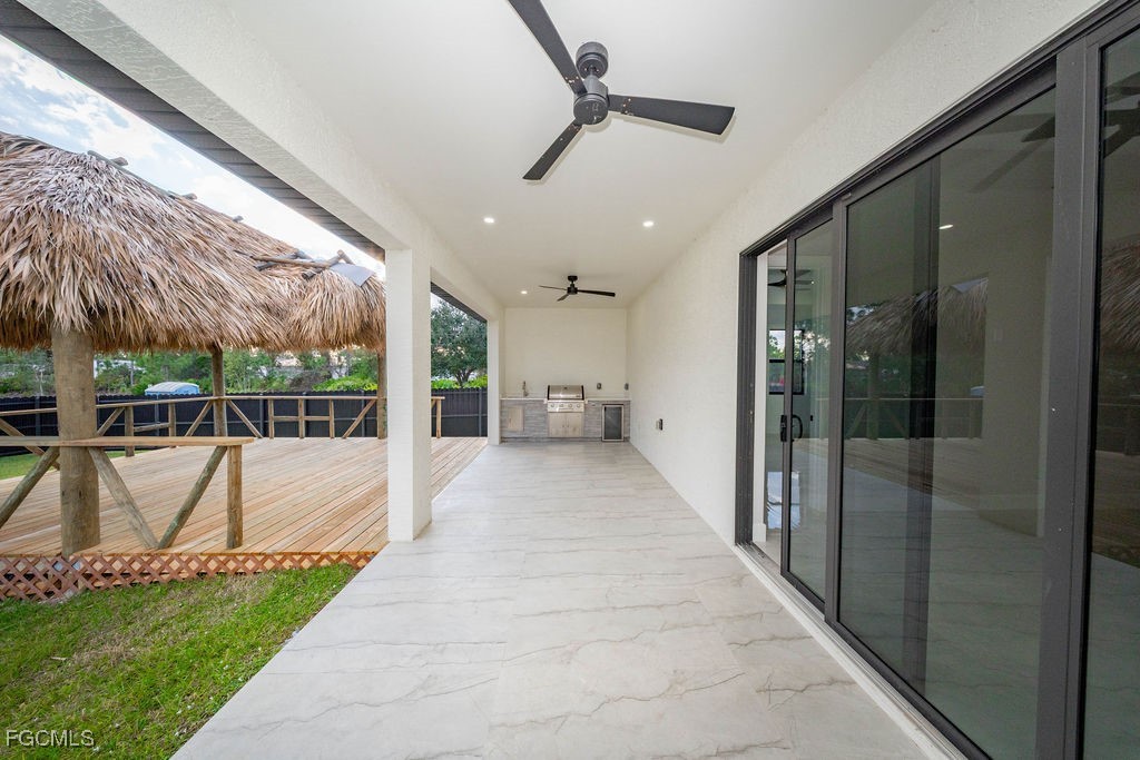 2819 34th Street West Lehigh Acres, FL 33971 - Photo 30 of 41 a view of a swimming pool with a patio