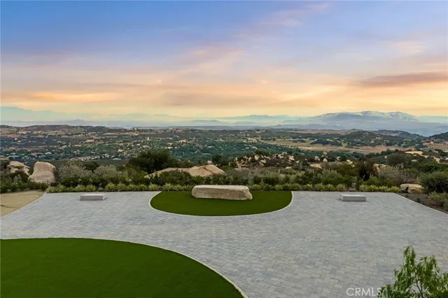 a view of a city with mountains in the background