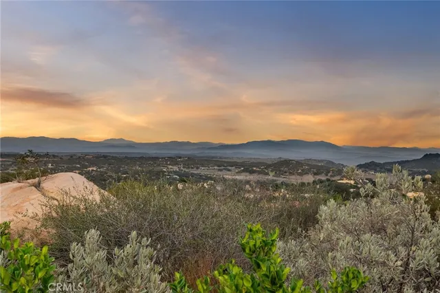 a view of lake with mountain