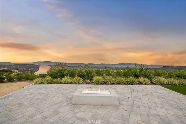 a view of an outdoor space and mountains