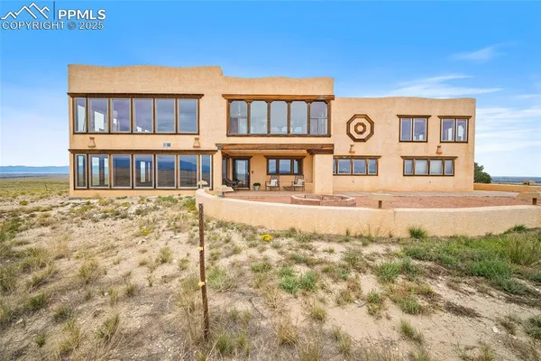 a front view of a building with street view