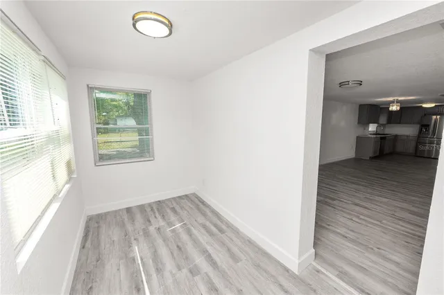 a view of livingroom with furniture and window