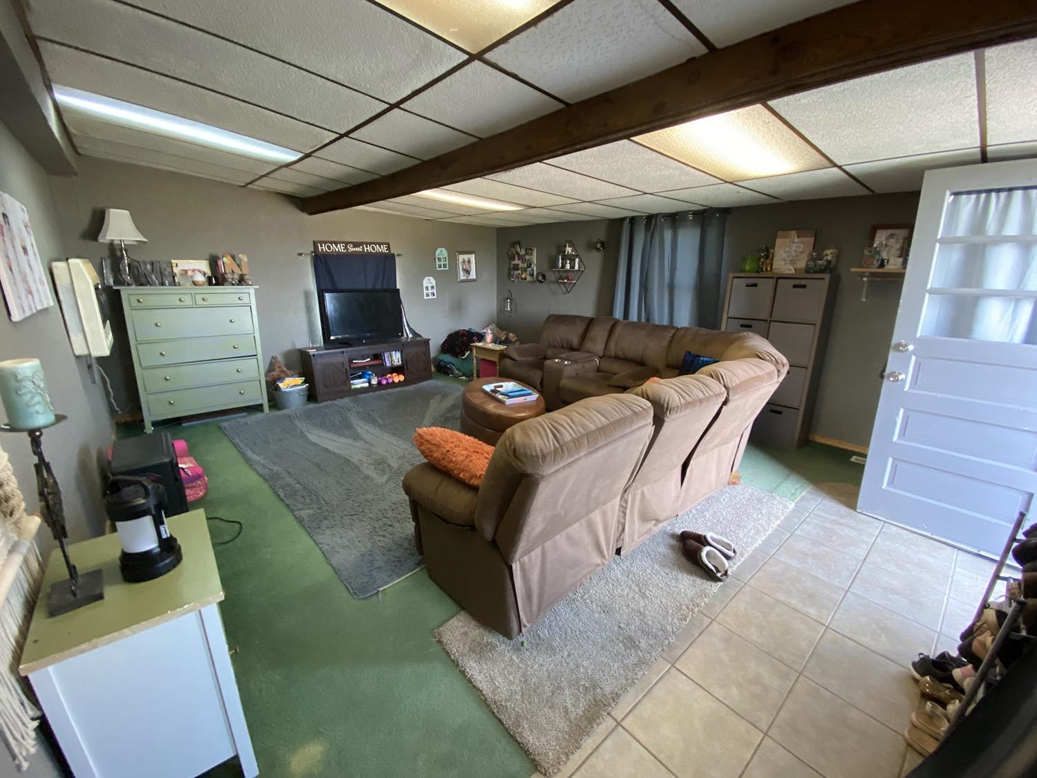 6510 Water Road Lanark, IL 61046 - Photo 14 of 38 a living room with furniture and a flat screen tv