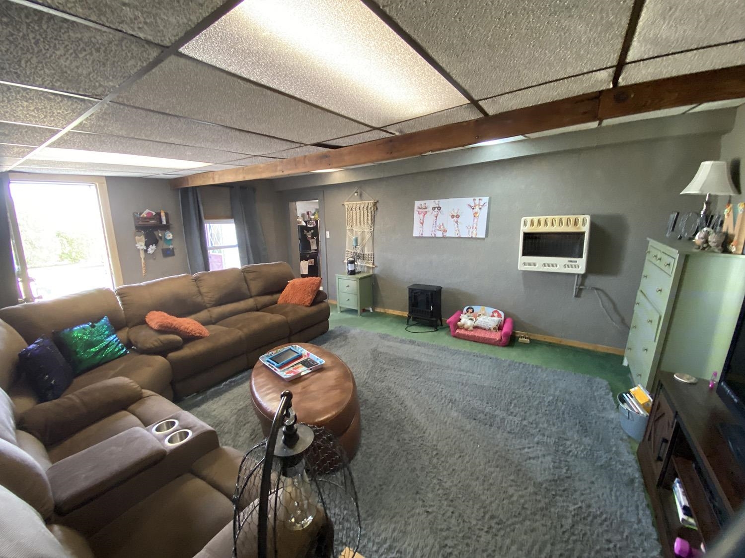 6510 Water Road Lanark, IL 61046 - Photo 17 of 38 a living room with furniture and a flat screen tv