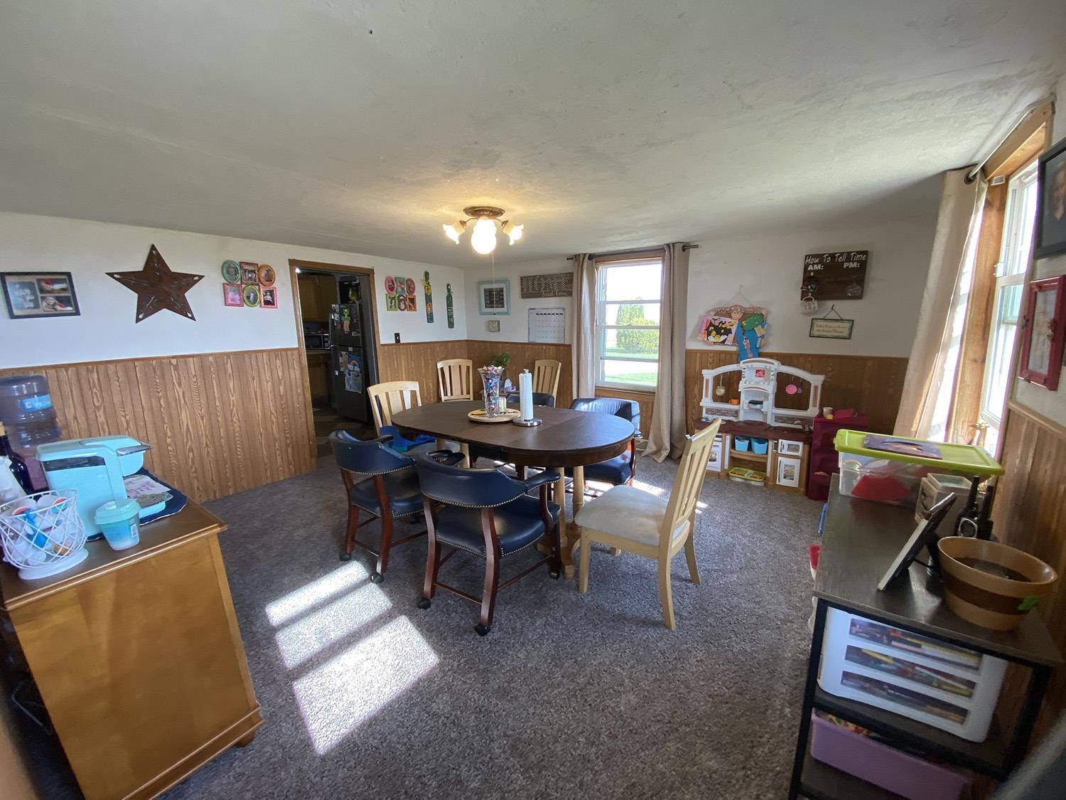 6510 Water Road Lanark, IL 61046 - Photo 18 of 38 a view of a livingroom and dining room