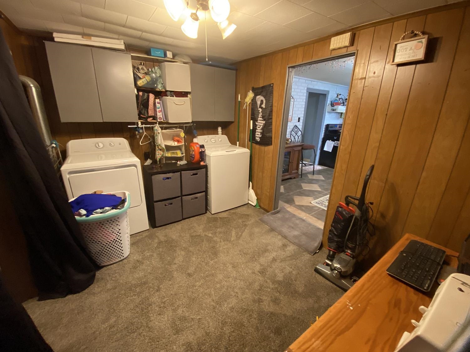 6510 Water Road Lanark, IL 61046 - Photo 22 of 38 a room with storage and utility