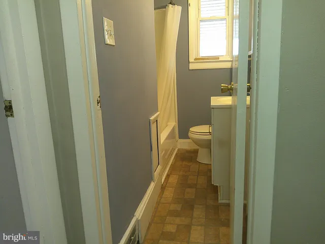 a bathroom with a toilet