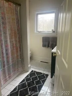 a bathroom with a sink and a shower