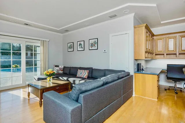 a living room with furniture and a table