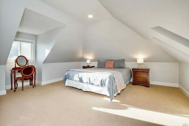 a view of a chairs and table in a patio
