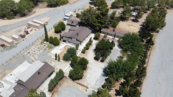 an aerial view of residential house with outdoor space