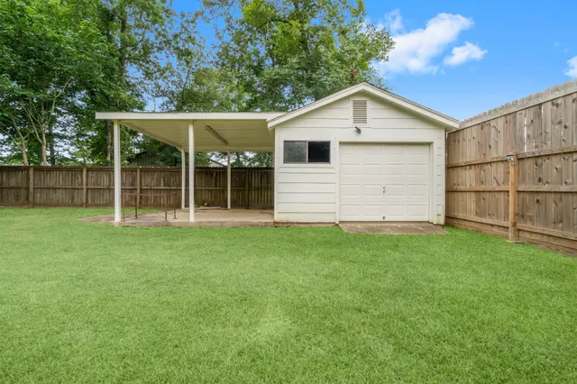 a view of a backyard of a house
