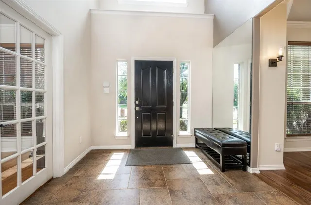 a view of a entryway door with living room