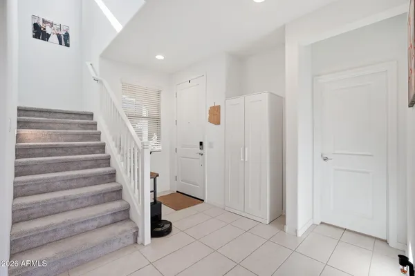 a view of entryway and hall with a window