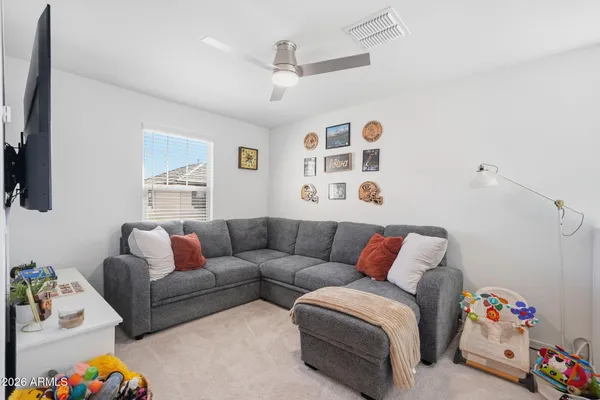 a living room with furniture and a couch