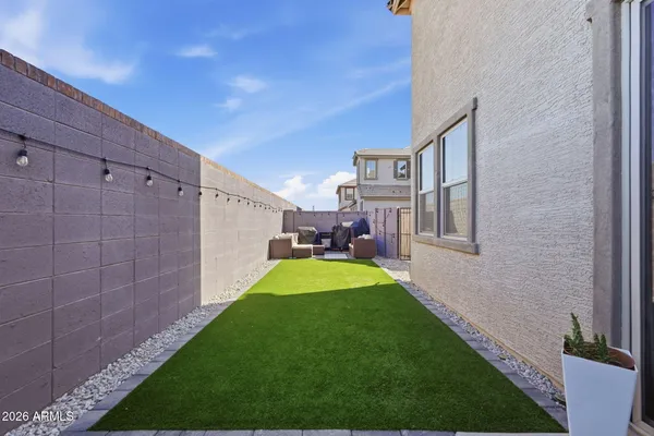 a view of a backyard with a garden