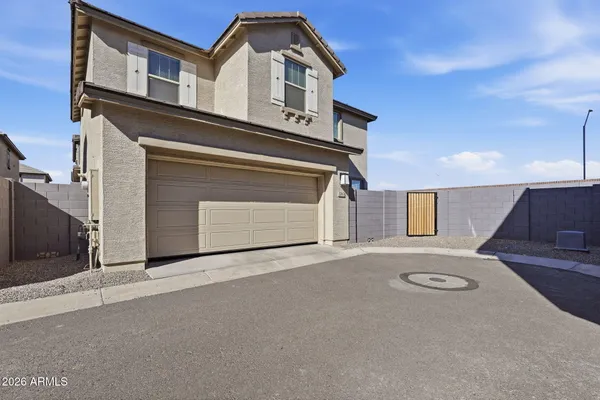 a front view of a house with a garage