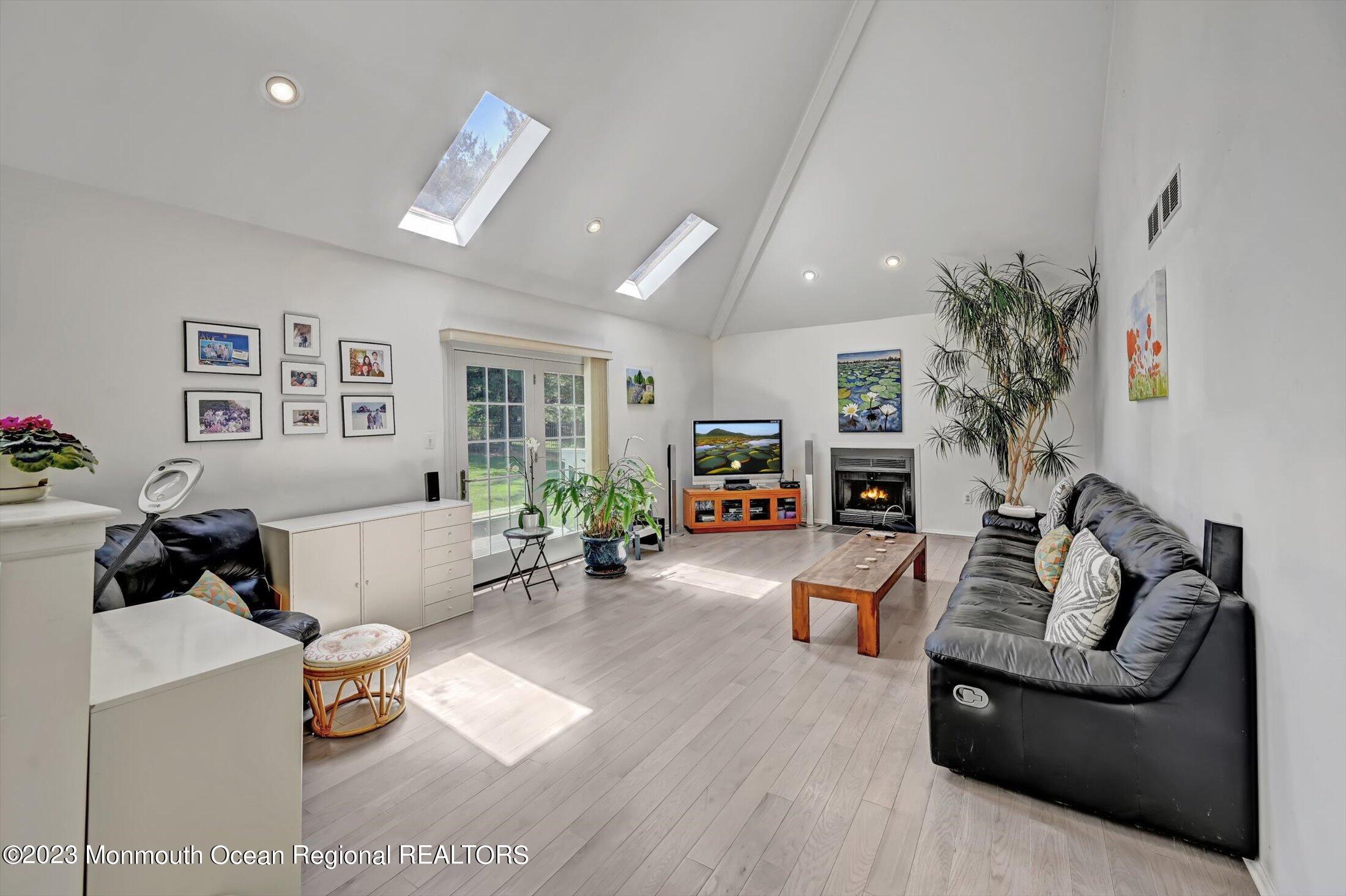201 Nottingham Road Morganville, NJ 07751 - Photo 19 of 53 Family Room with Fireplacem