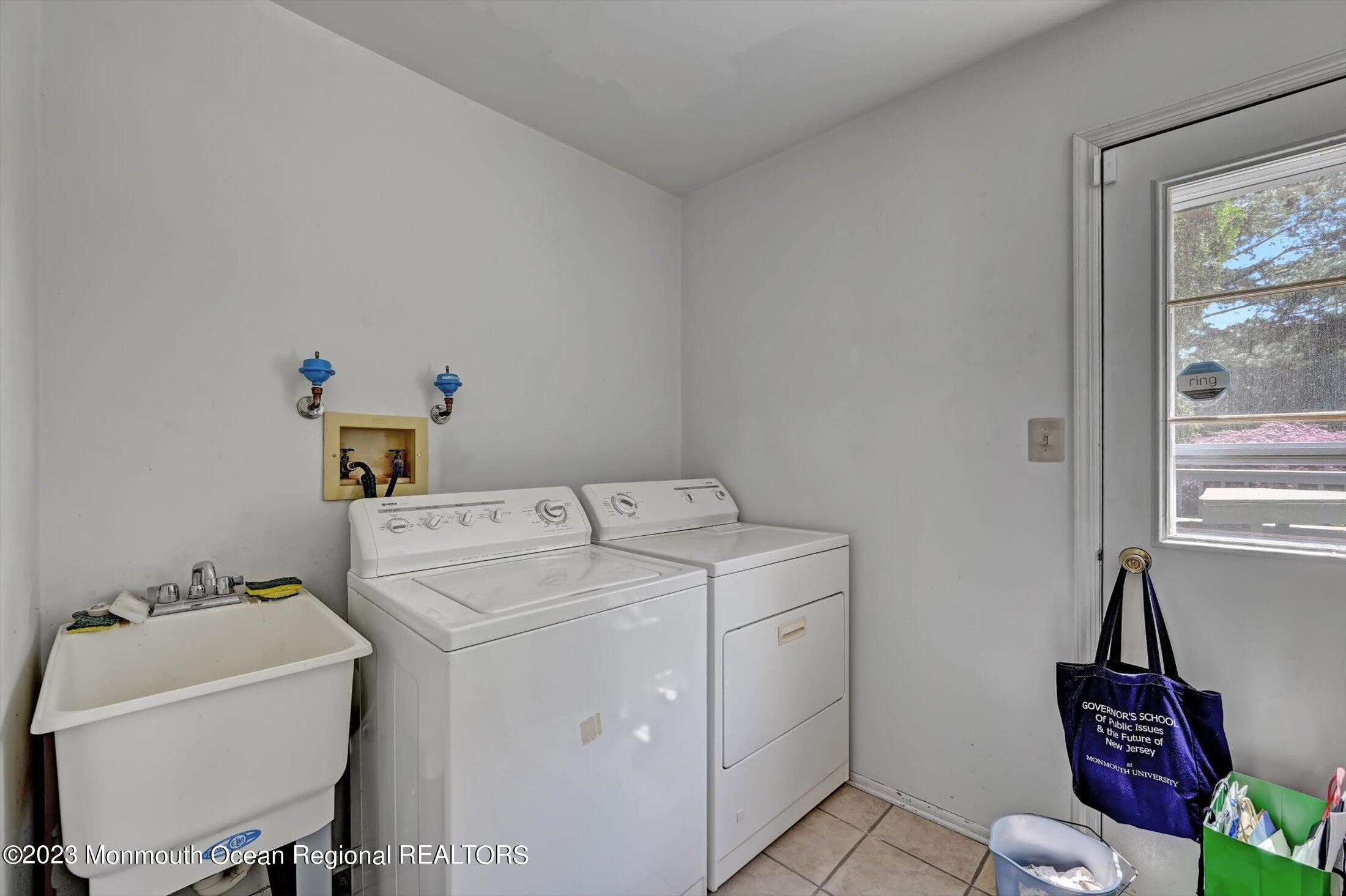 201 Nottingham Road Morganville, NJ 07751 - Photo 39 of 53 Access to backyard from Laundry room