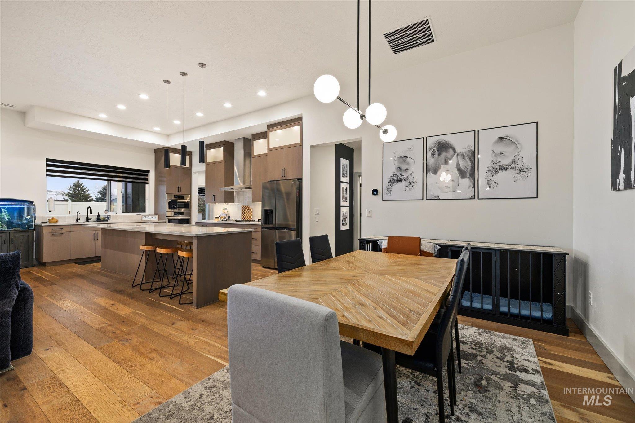 2250 South Steichen Way Meridian, ID 83642 - Photo 16 of 40 Dining area with recessed lighting and light wood-style floors