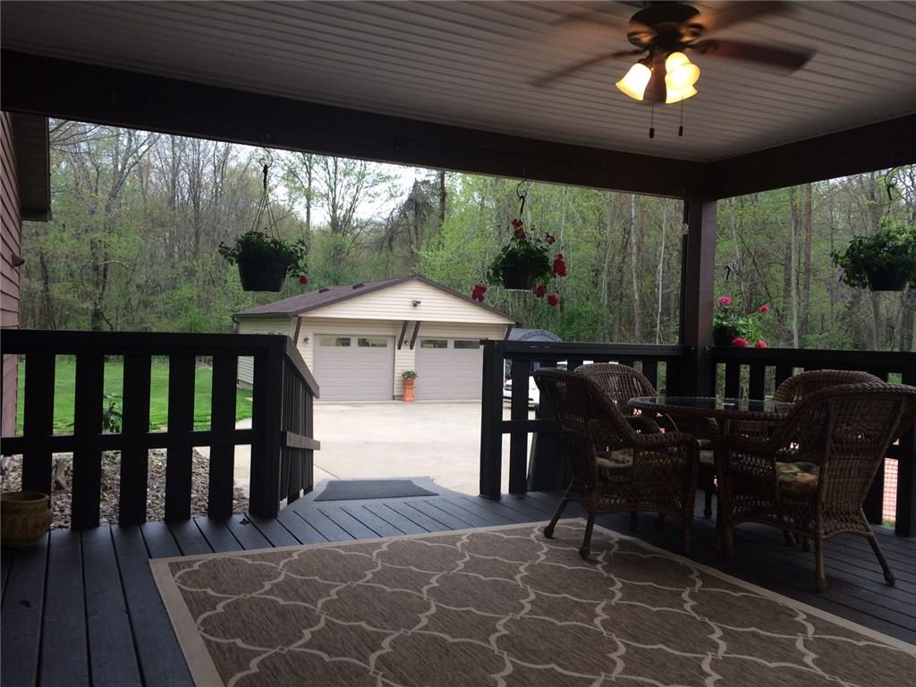 115 Hepler Road Sarver, PA 16055 - Photo 20 of 23 View from the deck to the detached garage and ample cement circular driveway.