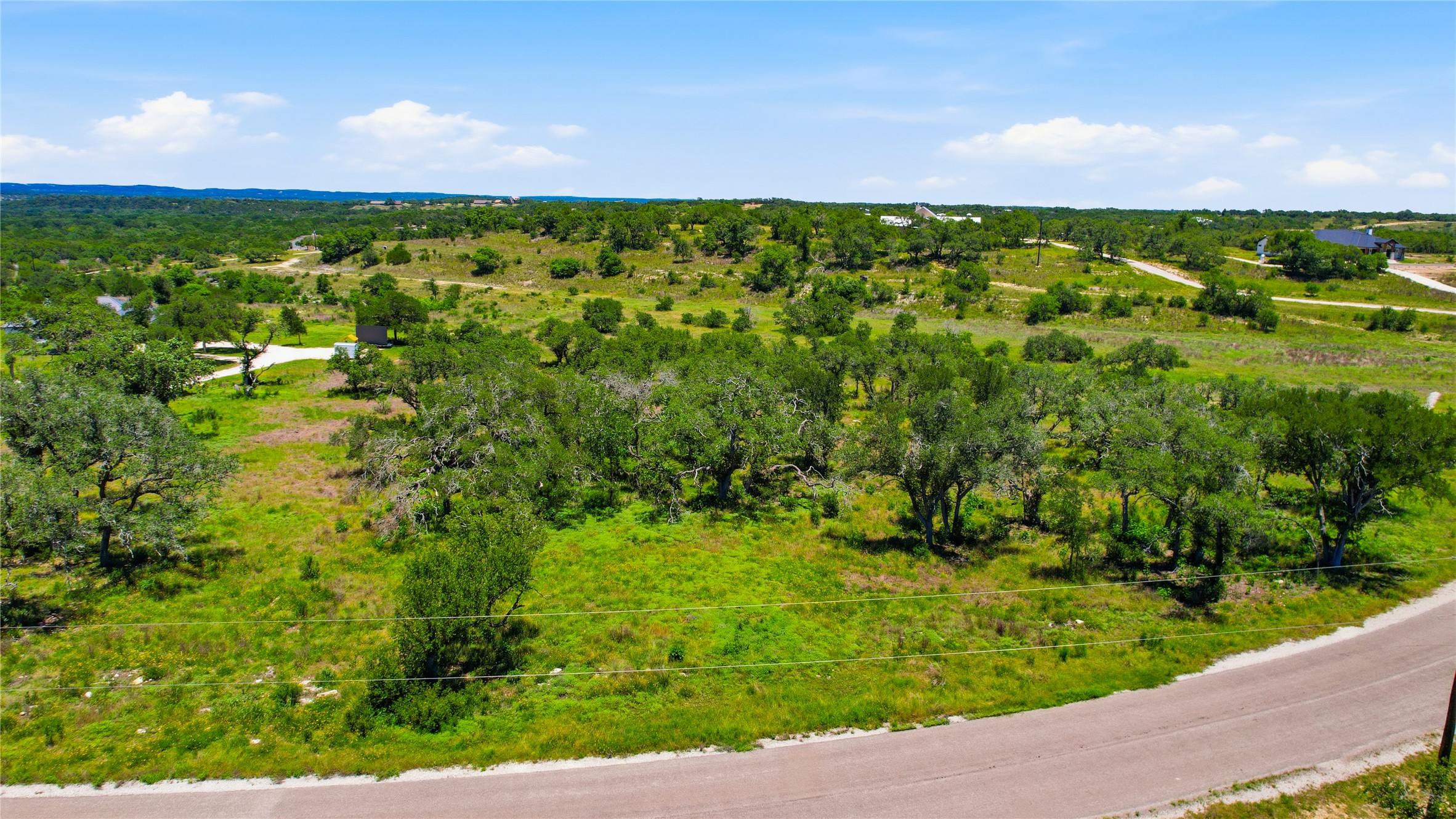623 Whiskey Trail Blanco, TX 78606 - Photo 5 of 23 The neighborhood community offers distant views tranquility