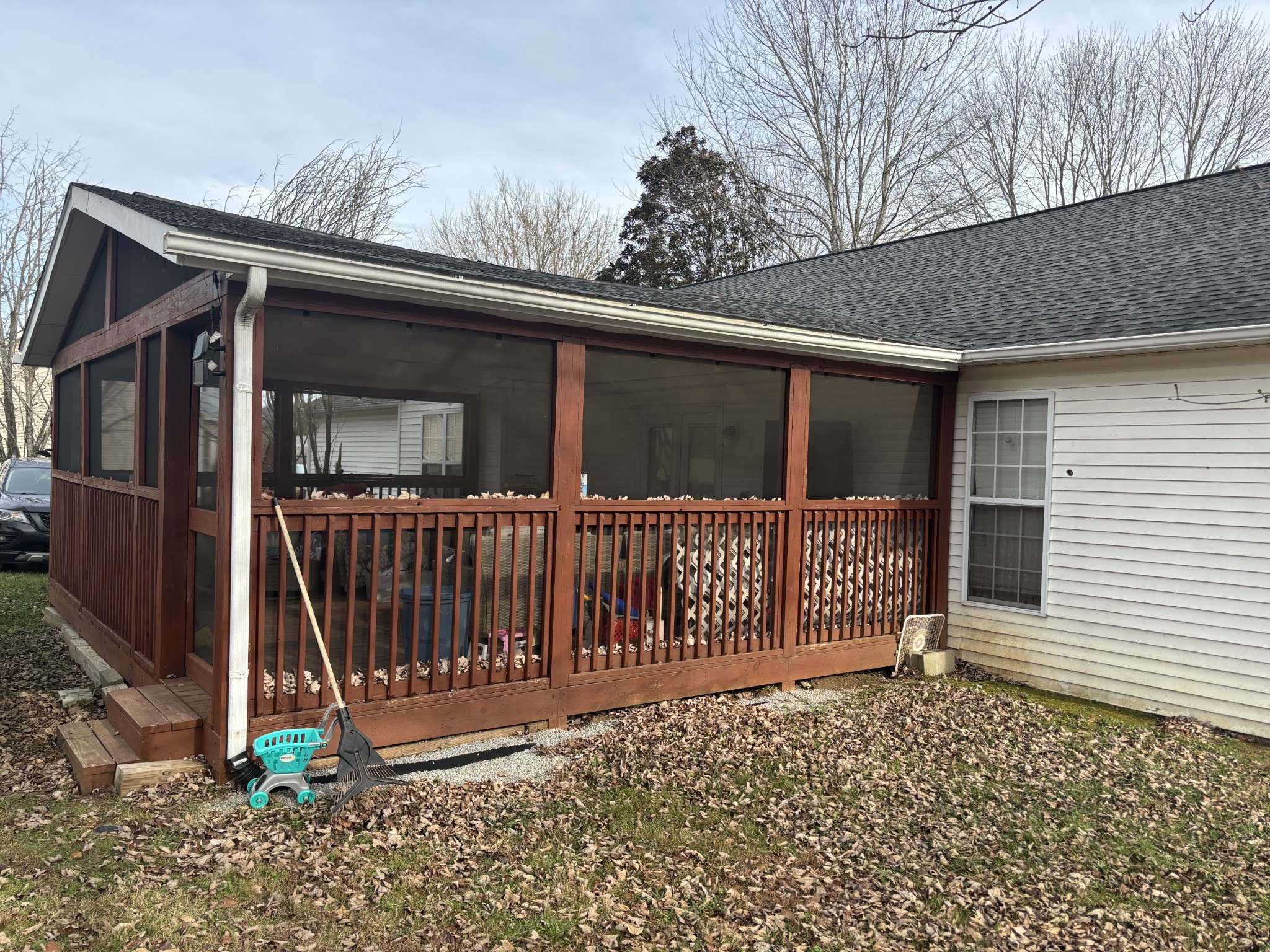 2892 Dodson Gap Road Culleoka, TN 38451 - Photo 13 of 13 a view of a house with a small yard and wooden fence and large trees