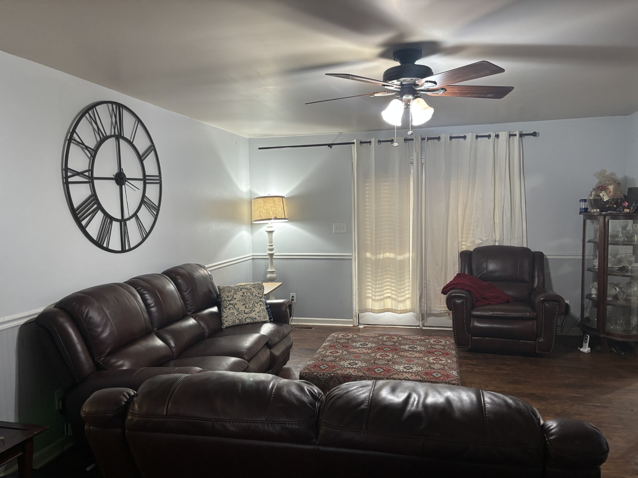 2892 Dodson Gap Road Culleoka, TN 38451 - Photo 2 of 13 a living room with furniture a chandelier fan and a window
