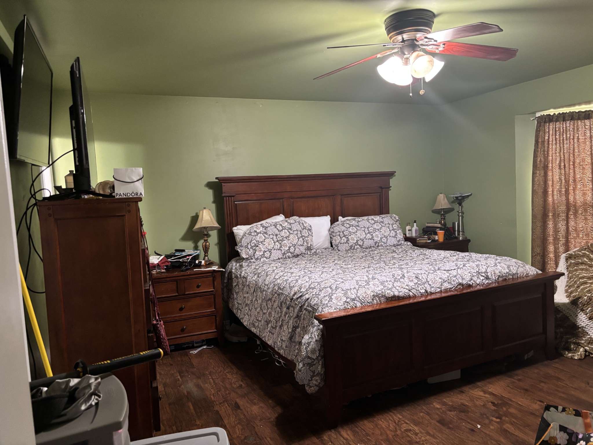2892 Dodson Gap Road Culleoka, TN 38451 - Photo 7 of 13 a bedroom with a bed dresser and a flat tv screen