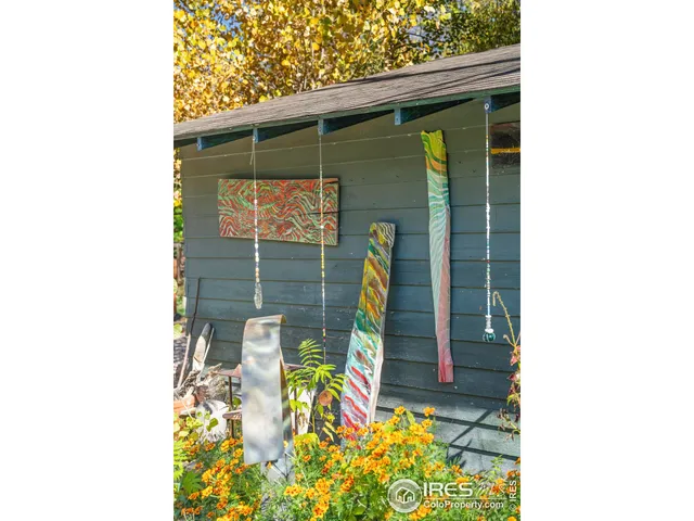 a living room with furniture and white walls
