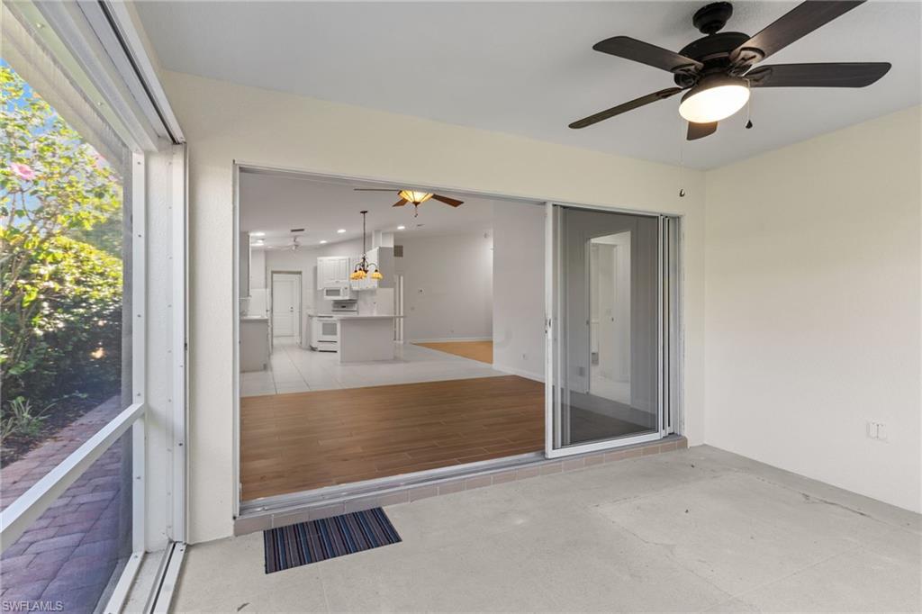 4907 Kingston Way Naples, FL 34119 - Photo 25 of 49 a view of kitchen with furniture and a ceiling fan