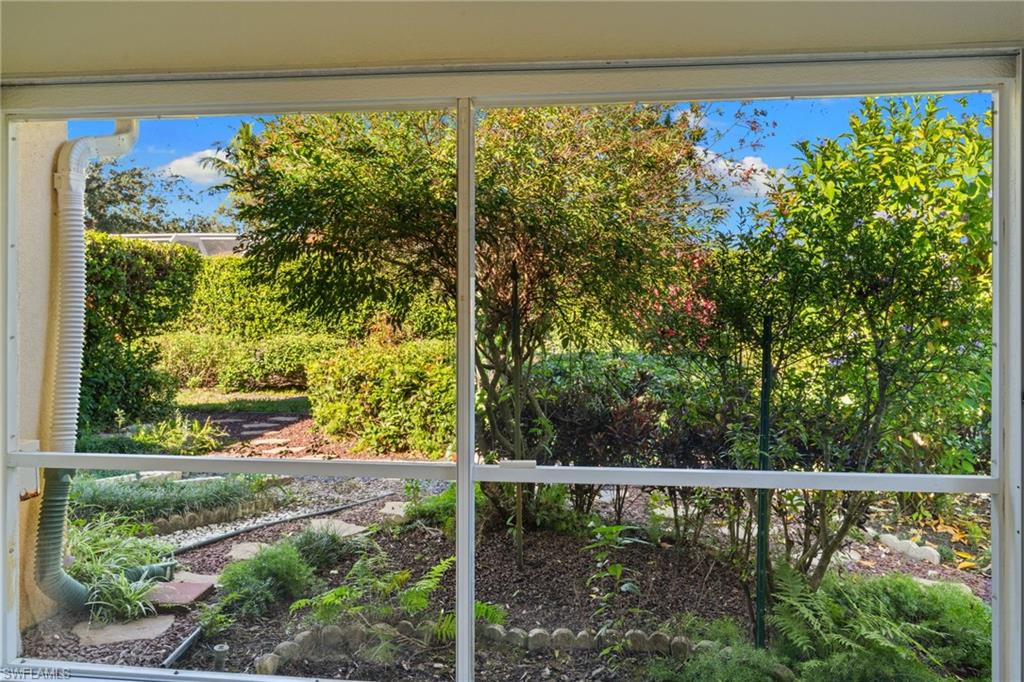 4907 Kingston Way Naples, FL 34119 - Photo 28 of 49 a view of a yard