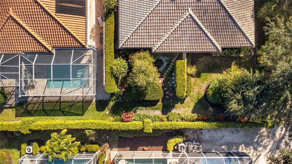 4907 Kingston Way Naples, FL 34119 - Photo 43 of 49 a front view of a house