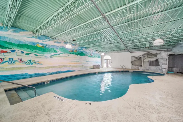 a view of a swimming pool with a terrace